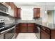 Kitchen featuring stainless steel appliances and granite counters at 12232 Trailhead Dr, Bradenton, FL 34211