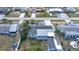 Aerial view of property highlighting backyard, updated roof, landscaping, and proximity to neighborhood amenities at 1790 Pomelo Dr, Venice, FL 34293