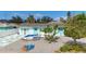 Charming home featuring a delightful front yard design with white and blue accents at 1790 Pomelo Dr, Venice, FL 34293