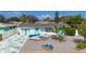 Charming home featuring a delightful front yard design with white and blue accents at 1790 Pomelo Dr, Venice, FL 34293