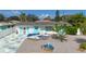 Charming home featuring a delightful front yard design with white and blue accents at 1790 Pomelo Dr, Venice, FL 34293