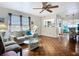 Inviting living room features beautiful hardwood floors and plenty of natural light at 1790 Pomelo Dr, Venice, FL 34293