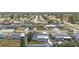 An elevated aerial view showcasing the home’s placement and neighborhood of well-maintained homes and quiet streets at 1790 Pomelo Dr, Venice, FL 34293