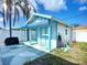 Exterior of shed with covered patio area, offering space for outdoor activities at 1790 Pomelo Dr, Venice, FL 34293