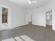 Spacious bedroom with ensuite bathroom and ample natural light from the sliding glass doors at 5154 51St W Ln, Bradenton, FL 34210