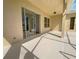 Covered patio features sliding glass doors and plenty of space for outdoor seating and entertaining at 5154 51St W Ln, Bradenton, FL 34210