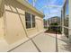 Enclosed patio area with light-colored flooring and a view of the outdoor landscape at 5154 51St W Ln, Bradenton, FL 34210