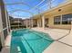 Inviting screened-in pool with crystal-clear water, perfect for relaxation and outdoor enjoyment at 5154 51St W Ln, Bradenton, FL 34210