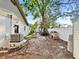 Backyard featuring a playhouse and mature trees at 7490 Locust Ne St, St Petersburg, FL 33702
