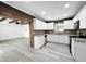 This kitchen features white cabinets, granite countertops, a tile backsplash, and stainless steel appliances at 7490 Locust Ne St, St Petersburg, FL 33702