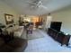 Spacious living room offering a relaxing space with natural light and tile floors at 129 Caryl Way # 129, Oldsmar, FL 34677