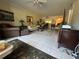 Spacious living room featuring neutral toned decor and abundant natural light at 129 Caryl Way # 129, Oldsmar, FL 34677