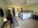 Large main bedroom featuring neutral colored walls and a ceiling fan at 129 Caryl Way # 129, Oldsmar, FL 34677