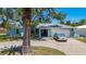 Charming single-story home with a well-maintained yard, mature tree, and a private driveway at 1369 Brookside Dr, Venice, FL 34285