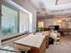 Kitchen features a large window and unfinished cabinetry ready for customization at 1369 Brookside Dr, Venice, FL 34285