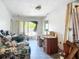 Living room with backyard access, and a stylish couch at 1369 Brookside Dr, Venice, FL 34285
