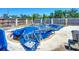 Outdoor pool covered with a blue tarp in need of some TLC at 1369 Brookside Dr, Venice, FL 34285