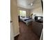 Cozy bedroom with a twin bed, desk, and workout equipment offers a versatile space at 22227 Elmira Blvd, Port Charlotte, FL 33952