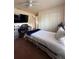 Bright bedroom with a bed, desk, and closet offers a functional and comfortable space at 22227 Elmira Blvd, Port Charlotte, FL 33952