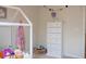 Bright room with tall chest of drawers and charming decor, creating a cozy and playful atmosphere at 32618 Rapids Loop, Wesley Chapel, FL 33545
