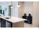 Stylish kitchen island with quartz countertop and modern fixtures, perfect for entertaining at 32618 Rapids Loop, Wesley Chapel, FL 33545