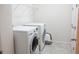 Functional laundry room with modern washer and dryer, offering convenience and efficiency for household chores at 32618 Rapids Loop, Wesley Chapel, FL 33545
