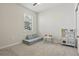bedroom with plenty of natural light, carpet flooring, and a cozy play area at 16231 Pine Mist Dr, Bradenton, FL 34211