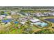 Aerial view of a community featuring a pool, basketball court, playground, and parking at 16231 Pine Mist Dr, Bradenton, FL 34211