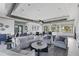 Clubhouse living room with comfortable seating, stylish decor, and ample natural light at 16231 Pine Mist Dr, Bradenton, FL 34211