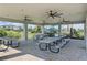 Community pavilion with picnic tables, ceiling fans, and ample space for outdoor gatherings and relaxation at 16231 Pine Mist Dr, Bradenton, FL 34211