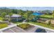 Community playground with a covered picnic area and landscaping, surrounded by parking and residential homes at 16231 Pine Mist Dr, Bradenton, FL 34211