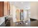 Kitchen featuring dark granite counters, stainless steel appliances, and ample cabinet space at 3319 Thistledown Ln, Land O Lakes, FL 34638