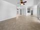 Expansive living area with tile flooring offers versatility in design and natural light at 6370 Sturbridge Ct, Sarasota, FL 34238