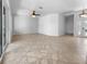 Spacious living room with tile flooring, and an open layout bathed in natural light at 6370 Sturbridge Ct, Sarasota, FL 34238