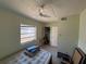 Bedroom with tile flooring, ceiling fan and an air mattress at 10709 Dowry Ave, Tampa, FL 33615