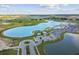 Aerial view of a resort-style lagoon in a vibrant community at 31840 Magna Gulf Loop, San Antonio, FL 33576
