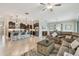 Open-concept living area with a seamless flow from the living room to the kitchen and dining space at 31840 Magna Gulf Loop, San Antonio, FL 33576