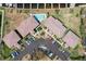 Aerial view of condo community with pool, parking, and well-manicured grounds at 3221 White Ibis Ct # C1, Punta Gorda, FL 33950
