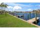 Waterfront property with boat docks and lush green landscaping, stunning views at 3221 White Ibis Ct # C1, Punta Gorda, FL 33950