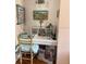 Cozy nook featuring a built-in desk with storage, illuminated by modern lighting and adorned with artistic decor at 3585 41St S Way # D, St Petersburg, FL 33711