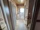 Bathroom featuring a vanity, tile flooring, and a glass-enclosed shower at 4299 Bullard St, North Port, FL 34287