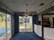 Dining room with sliding glass doors leading to the pool and backyard at 4299 Bullard St, North Port, FL 34287
