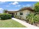 Beautiful home with a well-manicured lawn and walkway leading to the front door at 6108 Penny Ln # 0, Bradenton, FL 34207