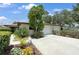 Inviting home with well-maintained landscaping, an ample driveway and a two-car garage at 6108 Penny Ln # 0, Bradenton, FL 34207