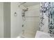 Clean bathroom showcasing updated shower with decorative accents, and modern fixtures for a spa-like feel at 2616 Bayshore Gardens Pkwy, Bradenton, FL 34207