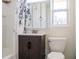 Bathroom featuring a modern vanity, updated fixtures, and a shower-tub combination for relaxation at 2616 Bayshore Gardens Pkwy, Bradenton, FL 34207
