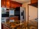 Kitchen showcasing granite countertops and stainless steel appliances at 2616 Bayshore Gardens Pkwy, Bradenton, FL 34207