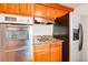 A close up view of the kitchen with stainless steel oven and cooktop at 2616 Bayshore Gardens Pkwy, Bradenton, FL 34207