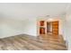 Bright living room featuring wood flooring and neutral walls at 2616 Bayshore Gardens Pkwy, Bradenton, FL 34207