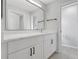 Bathroom featuring white vanity with countertop, modern faucet, and large mirror at 623 Sandy Creek Dr, Brandon, FL 33511